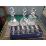 THREE CRYSTAL DECANTERS