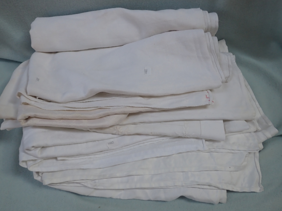 A COLLECTION OF LARGE VINTAGE TABLE CLOTHS