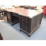 A 19TH CENTURY 'GOTHIC' OAK PARTNERS DESK