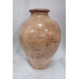 A CHINESE GLAZED BUFF POTTERY VASE