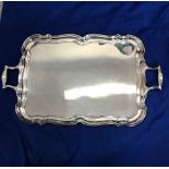 A SILVER PLATED TRAY