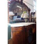 A LARGE VICTORIAN WALNUT SIDEBOARD, WITH CENTRAL OVAL MIRRORED DOOR