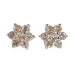 A PAIR OF DIAMOND CLUSTER EARRINGS