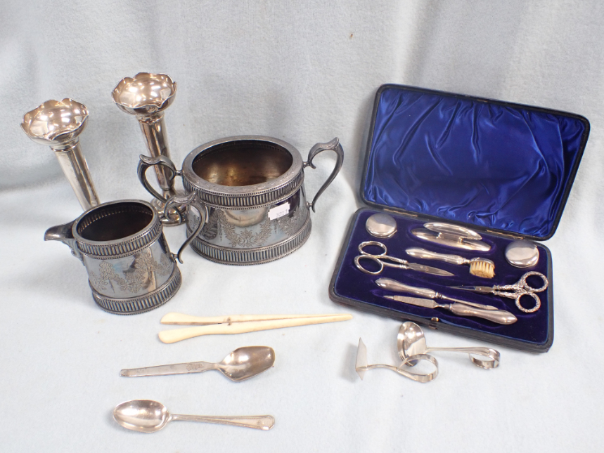 A SILVER NURSERY SPOON AND PUSHER