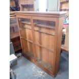 A GLAZED OAK CABINET,FITTED FOR WEAPON DISPLAY