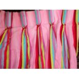 A PAIR OF VIVID CANDY STRIPE CURTAINS