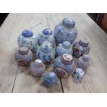 A COLLECTION OF BLUE AND PINK GINGER JARS