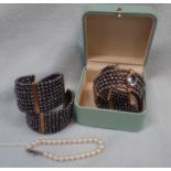 TWO MODERN PEARL BANGLES AND PEARL BRACELET