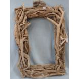 A DRIFTWOOD COVERED FRAME