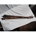A COLLECTION OF VIOLIN BOWS
