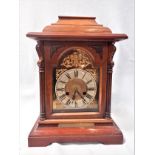 AN EDWARDIAN WALNUT CASED BRACKET CLOCK