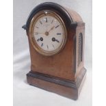 A WALNUT AND EBONISED CASED CLOCK