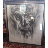 A LARGE SCALE CHARCOAL STUDY OF A MAN'S FACE