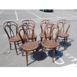 A SET OF SIX BENTWOOD CHAIRS, WITH STAMPED PLYWOOD SEATS