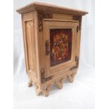 A GOTHIC STYLE OAK HANGING WALL CABINET