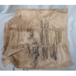 A CANVAS BAG ROLL OF MEDICAL INSTRUMENTS
