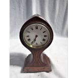 AN EDWARDIAN MAHOGANY CASED 'BALLOON' CLOCK