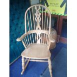 A MODERN BEECHWOOD HOOP-BACK WINDSOR ROCKING CHAIR