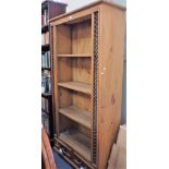 A PINE OPEN BOOKCASE