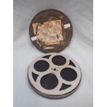 A REEL OF 16MM CINE FILM, LABELLED 'CHARLIE THE CHAMP (SOUND)'