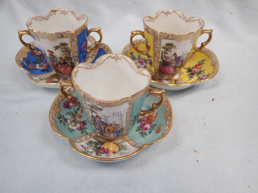 THREE DRESDEN CUPS AND SAUCERS