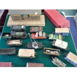 A HORNBY O GAUGE LOCOMOTIVE AND A COLLECTION OF ROLLING STOCK