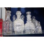 A COLLECTION OF CUT GLASS DECANTERS