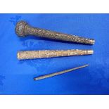 THREE EASTERN WHITE METAL PARASOL HANDLES