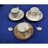 A FRENCH GILDED AND PAINTED CABINET CUP AND SAUCER