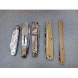 THREE SILVER AND MOTHER-OF-PEARL POCKET KNIVES AND TWO SIMILAR