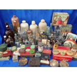 A COLLECTION OF VINTAGE BOTTLES AND TINS