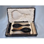 A BOXED SILVER AND TORTOISE SHELL DRESSING SET