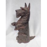 A IRON SCOTTISH TERRIER POKER STAND (SUITABLE FOR A DOORSTOP)