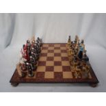 A MODERN CHESS SET WITH FIGURATIVE PIECES