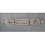 A NAILSEA TYPE WHITE GLASS ROLLING PIN