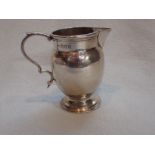 A LONDON SILVER CREAM JUG