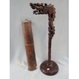 A CHINESE CARVED HARDWOOD LAMP STAND