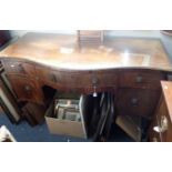 A GEORGE III MAHOGANY SERPENTINE FRONT SIDEBOARD