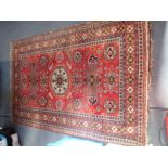 A TEKKE BOKHARA STYLE RUG