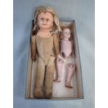 AN EARLY 20TH CENTURY BISQUE JOINTED DOLL