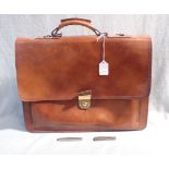 A MODERN LEATHER BRIEFCASE/SATCHEL