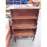 A 19TH CENTURY MAHOGANY 'WATERFALL' BOOKCASE