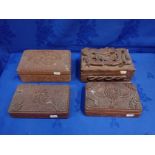FOUR ORIENTAL STYLE CARVED WOODEN BOXES