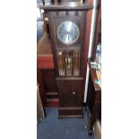 A 1920S OAK-CASED WALL CLOCK