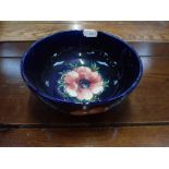 A MOORCROFT ANEMONE PATTERN ON BLUE GROUND BOWL