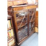 A MAHOGANY DISPLAY CABINET