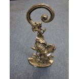 A BRASS CHERUB DOOR STOP