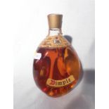 A BOTTLE OF JOHN HAIG DIMPLE WHISKY