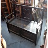 A 1920S OAK HALL BENCH