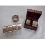 FOUR MODERN HEAVY-GAUGE SILVER NAPKIN RINGS